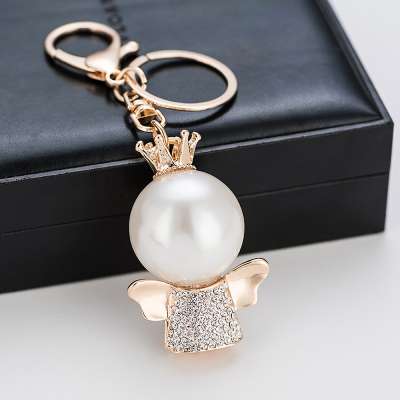 Wholesale Stock Small Order Korea Metal Cute Creative Mader Pearl Angel Bag Car Pendant Key Chain